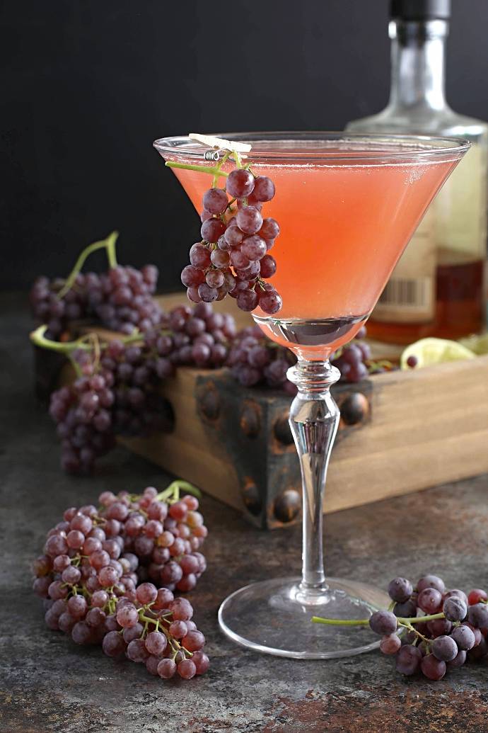 Grape-Bourbon-Smash-1 Recipe for a bourbon cocktail flavored with fresh grapes, lemon and elderflower liqueur.