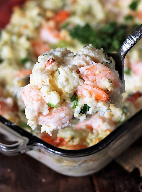 Serving Spoon with Shrimp and Grits Casserole Image