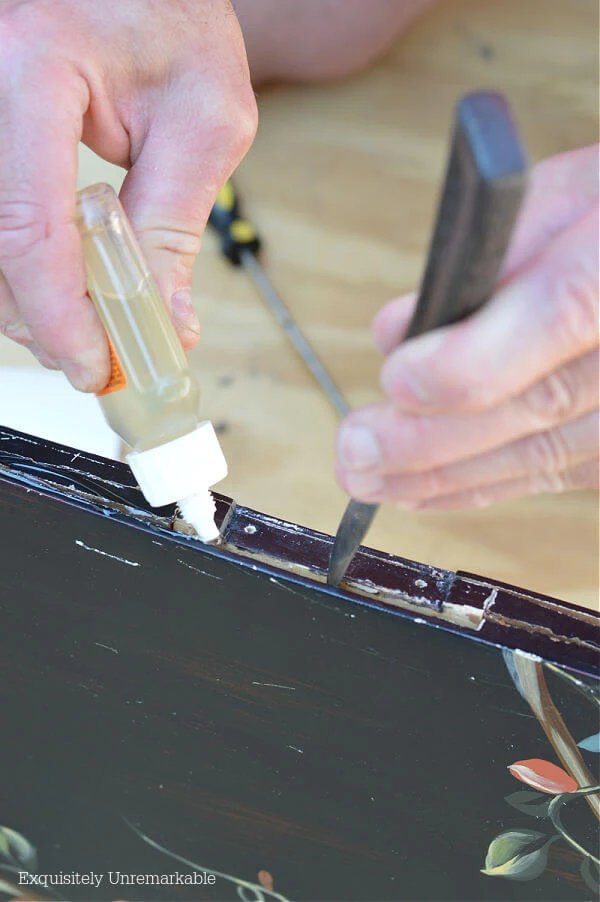 Repairing A Fireplace Screen with glue