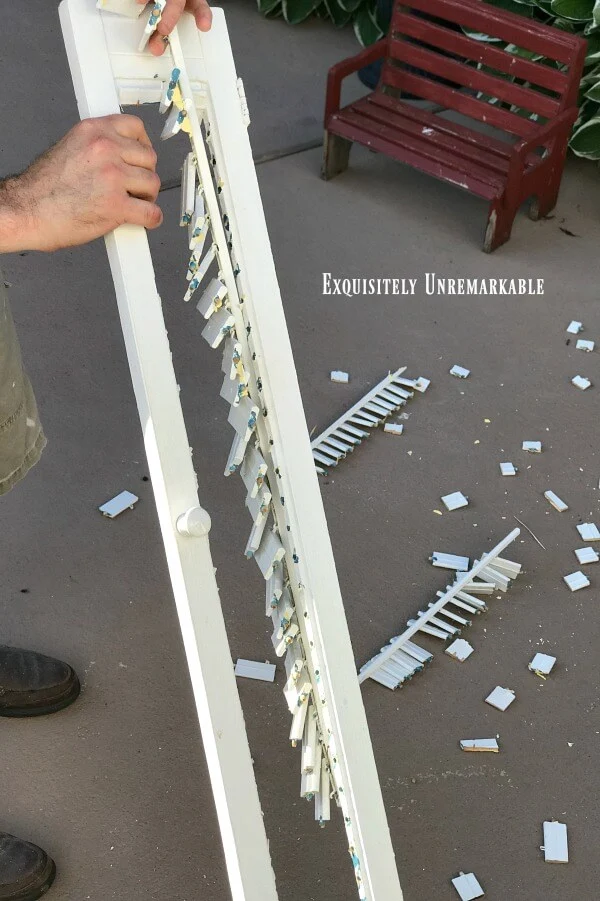 Removing Slats From Shutters by hand after cutting them apart