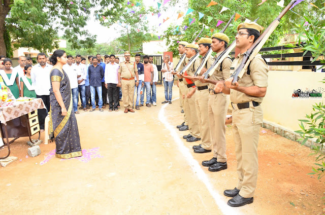 Swetha Mohanty Taking guard of honor from police officers in wanaparthy