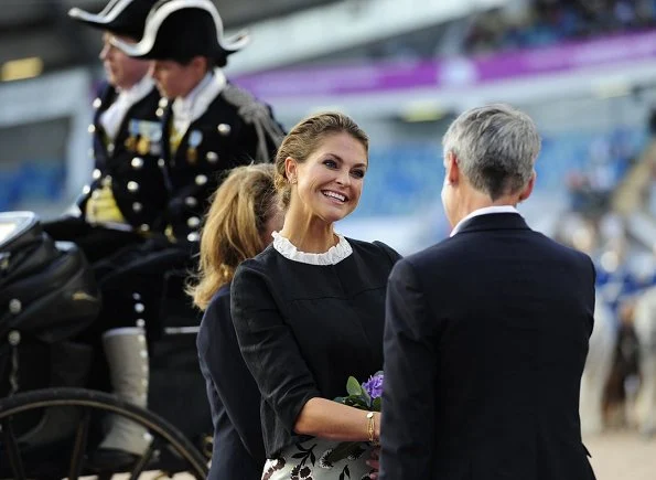 Princess Madeleine wears Alberta Ferretti Pleated Neck Wool Blend Jacket and Baum Und Pfergarten Sashenka Floral Midi Skirt