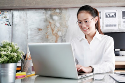 young-asian-businesswoman-working-with-laptop-computer-office_7190-1613.jpg