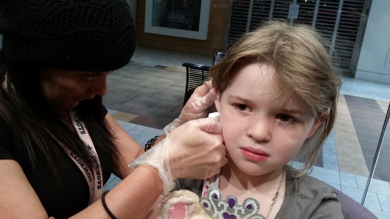 Twelve Makes a Dozen Getting Her Ears Pierced