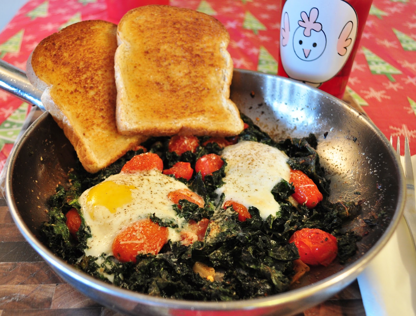 My Tiny Oven Baked Eggs with Kale and Tomatoes