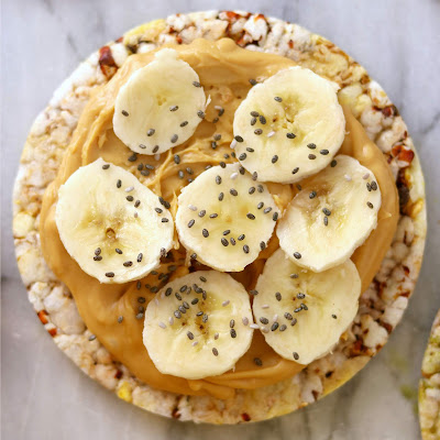 Real Foods Sorghum Thins with Peanut Butter Banana and Chia Seeds - Healthy Rice Cake Topping Ideas Recipes