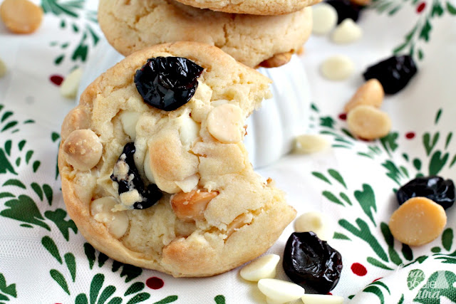 Chock full of creamy white chocolate chips, tart dried cherries, and crunchy macadamia nuts, these thick & chewy White Chocolate Cherry Macadamia Cookies would make the perfect addition to Santa's cookie plate.