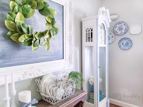 Less than $20 and I have a dining room decorated for summer! Come on by and see how I did it! www.diybeautify.com cottage dining room with painted grandfather clock
