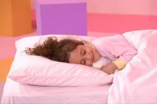 A little girl takes her favorite teddy bear with her and shows how she sleeps. Sesame Street Elmo's World Sleep Kids and Baby