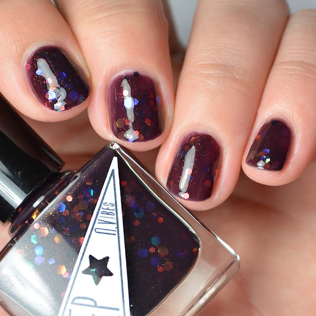 oxblood nail polish with iridescent glitter