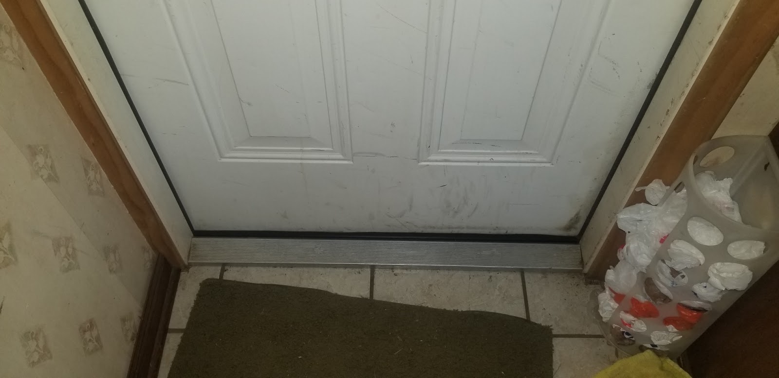 Fixing The bottom seal on an exterior door Fixing The bottom seal on an exterior door