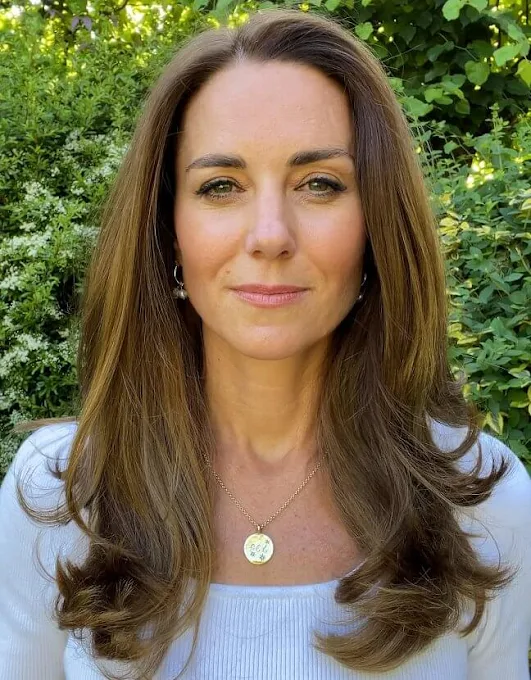 Kate Middleton wore a Nadalia top from Ralph Lauren, and gold hoops with pearls from Freya Rose