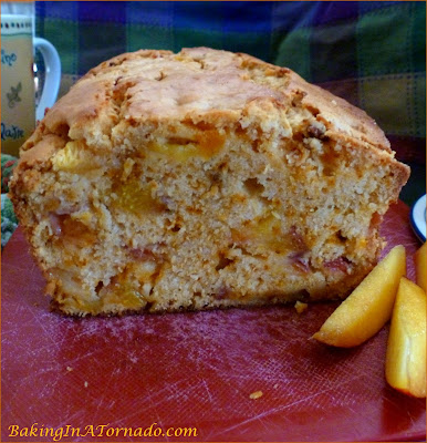 Cinnamon Nectarine Quick Bread, a moist quick cinnamon crusted bread filled with cinnamon flavor and chunks of nectarines. | Recipe developed by www.BakingInATornado.com | #recipe #bread #fruit