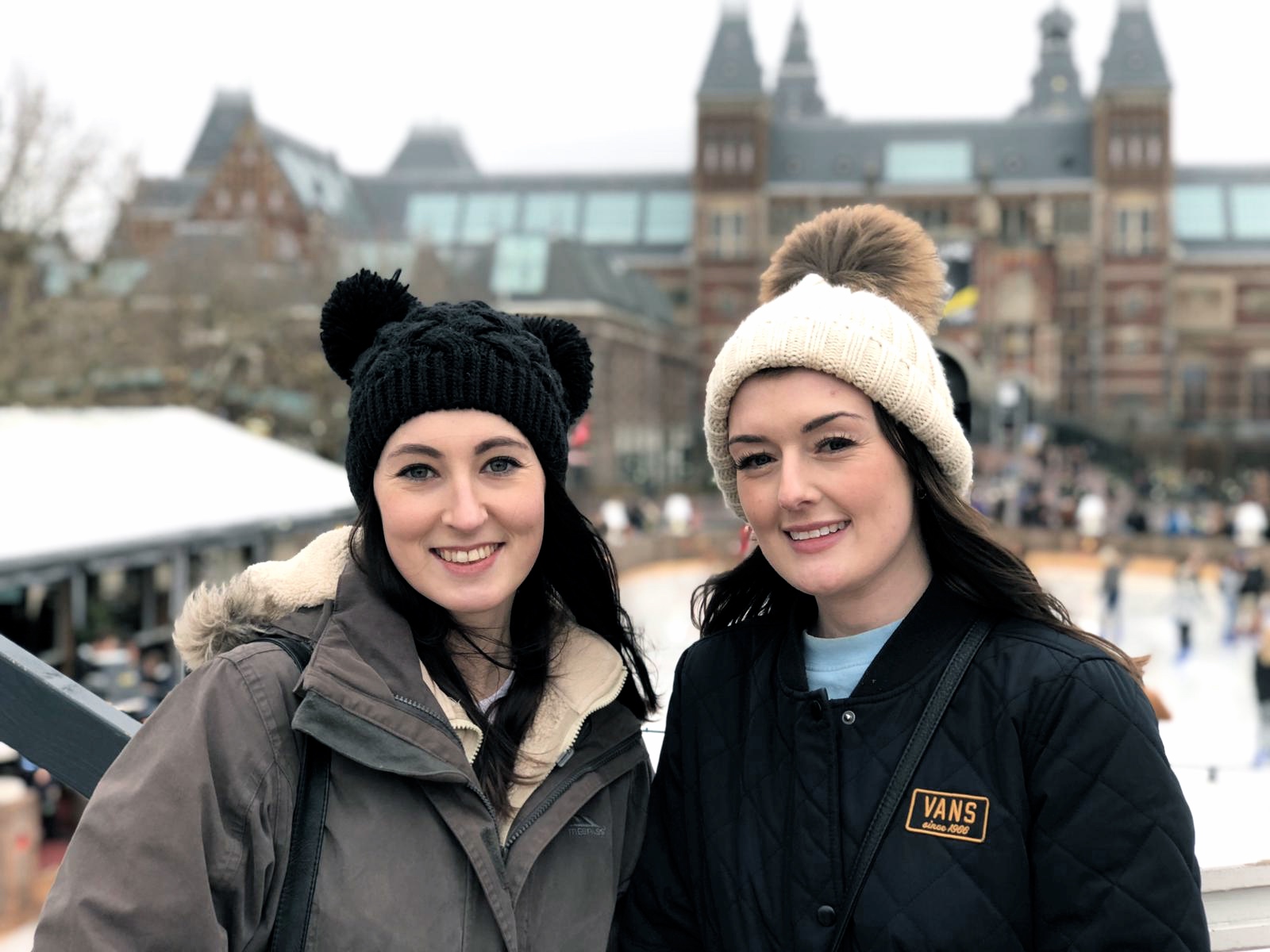 Best friends stood in front of Amsterdam ice rink