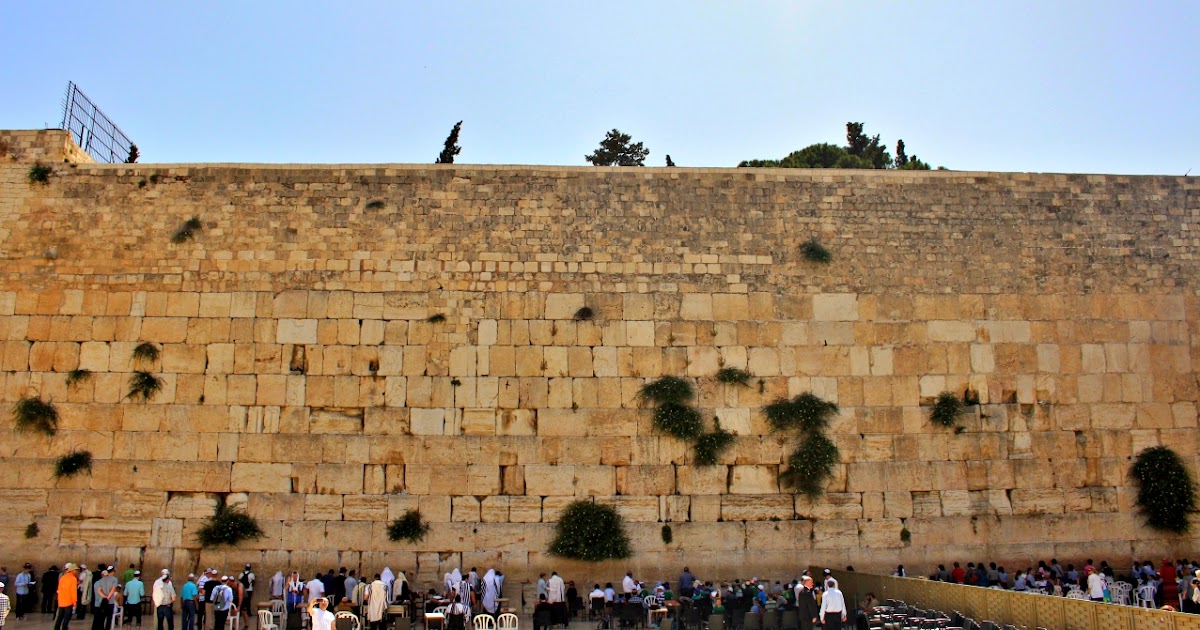 Reciting a Brief Prayer at the Wailing Wall in Jerusalem Israel
