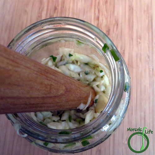 Morsels of Life - Japanese Sauerkraut Step 3 - Place mixture into a jar, and press/beat down until liquid covers all solids.