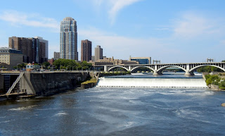 Views of downtown Minneapolis and St. Anthony Falls from the Stone Arch Bridge in Minnesota