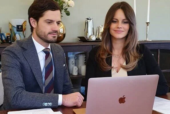 Swedish Institute for Educational Research. Princess Sofia wore a v-neck ivory dress and black jumper