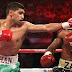 Amir Khan defeated Zab Judah in Light-Welterweight Unification Boxing Championship