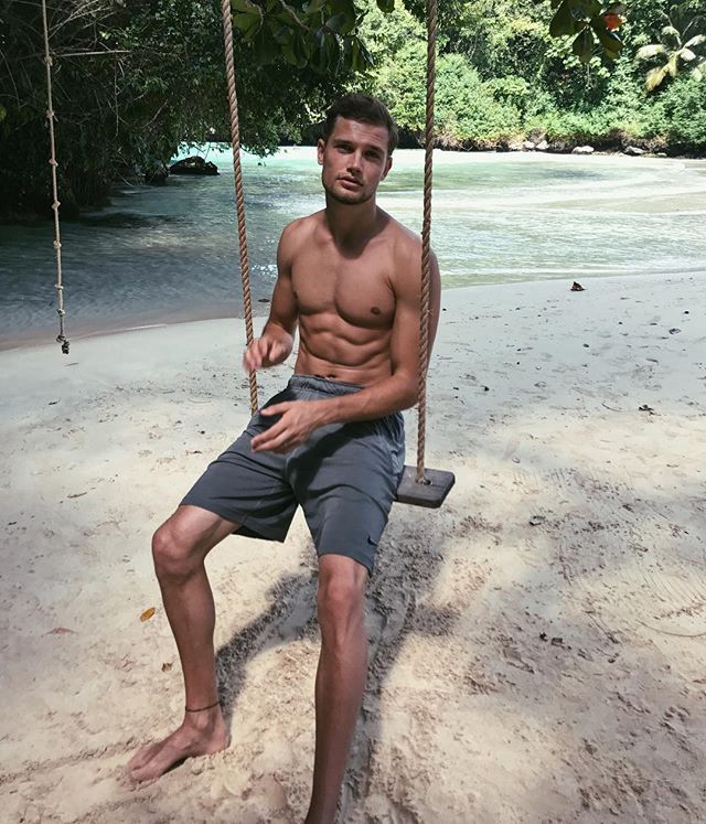 handsome-shirtless-fit-dude-enjoying-summer-vacation-beach-nature-swing