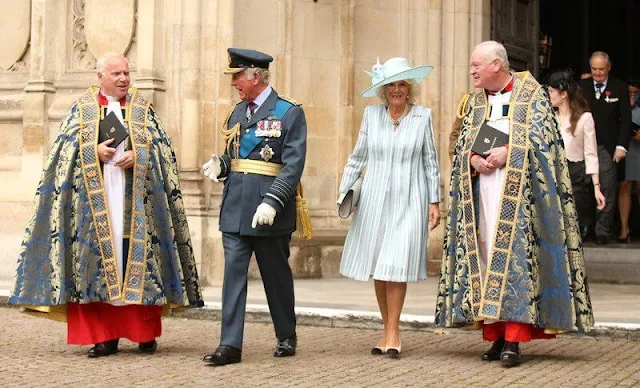 Duchess of Cornwall wore a striped dress by Bruce Oldfield. Duchess wore her pearl necklace and her RAF brooch