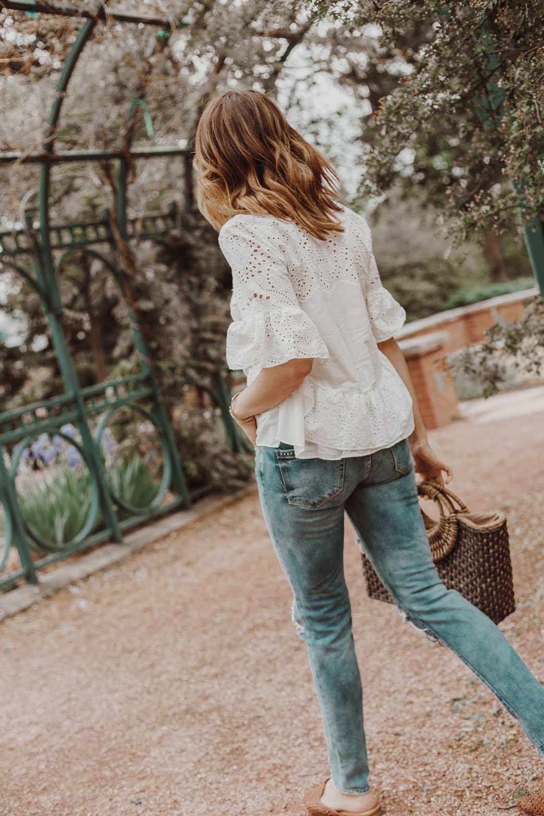 Chicwish White Eyelet Top styled by popular Colorado fashion blogger, Leah Behr