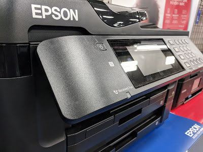 Impresora Epson de inyección de tinta con error de almohadillas de impresión llenas.