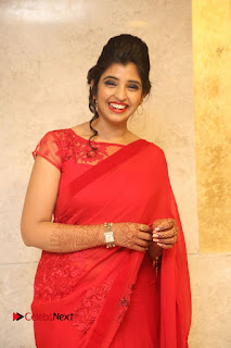 Actress Shyamala Stills in Red Saree at Okkadochadu Movie Audio Launch  0368