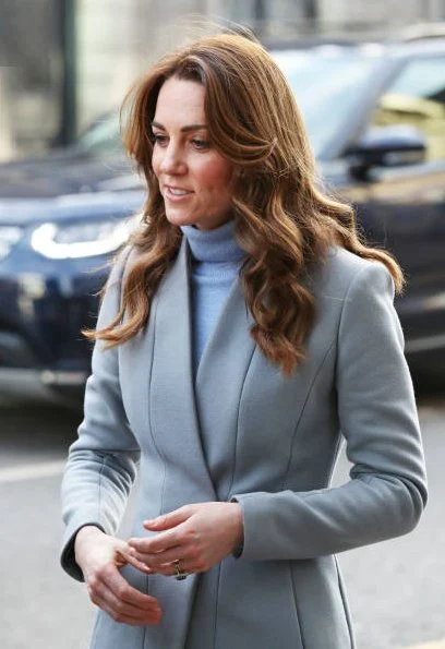 Kate Middleton wore a gray knit turtleneck, black skinny jeans, a khaki Barbour jacket, and knee-high Penelope Chilver boots