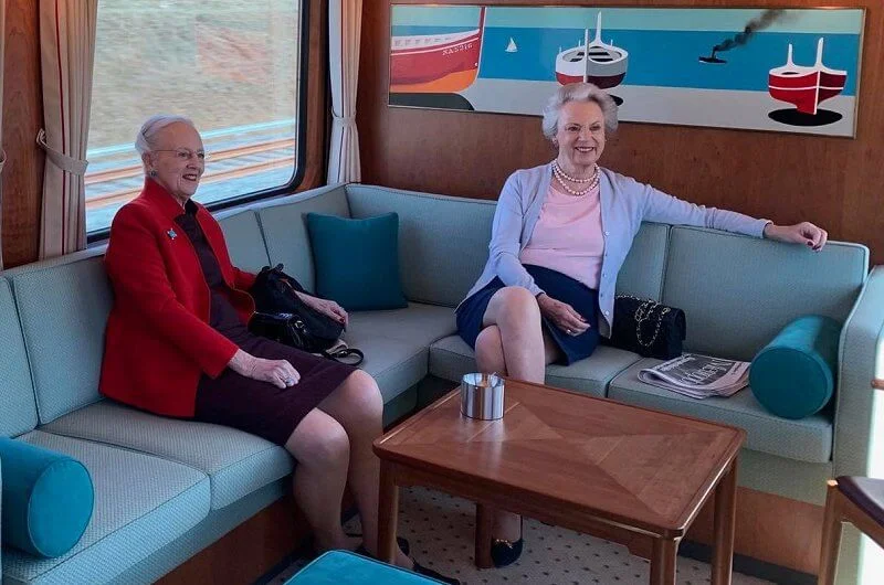 Queen Margrethe and Princess Benedikte visited the Queen's Embroideries exhibition. Red blazer and printed wool coat