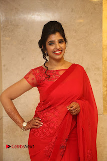 Actress Shyamala Stills in Red Saree at Okkadochadu Movie Audio Launch  0340
