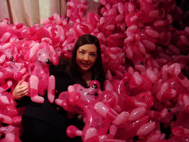 Sea of pink inflatable poodles