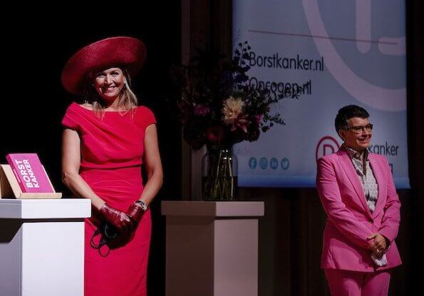 Dutch Breast Cancer Association. Queen Maxima wore a new short sleeve berry-red dress by Natan. Royal purple hat, earring Oscar de la Renta