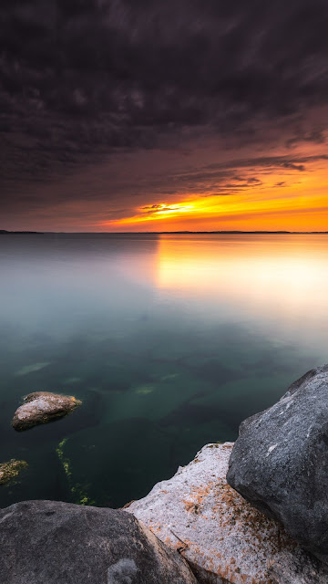 Screen background with serene views, sunset, skyline, sea, clouds. Screen background with serene views, sunset, skyline, sea, clouds.