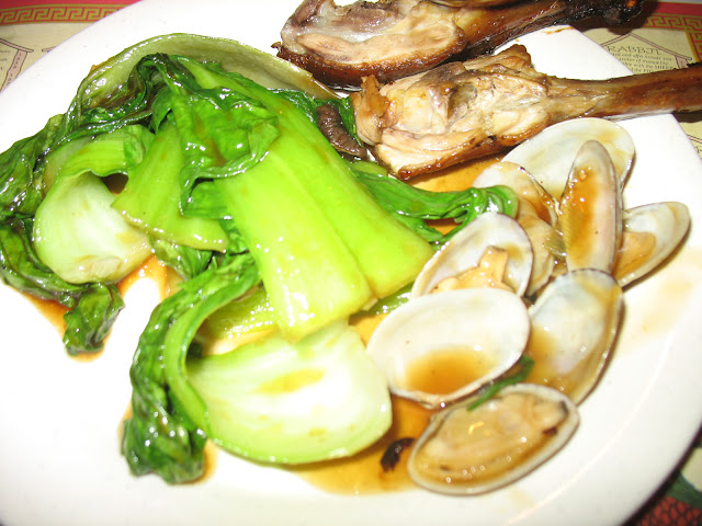 Two legs of Peking Duck, baby bok choy, and baby clams!