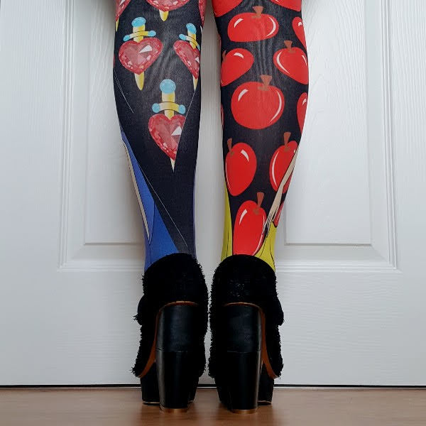back view of apple and dagger heart tights with wood heeled shoes