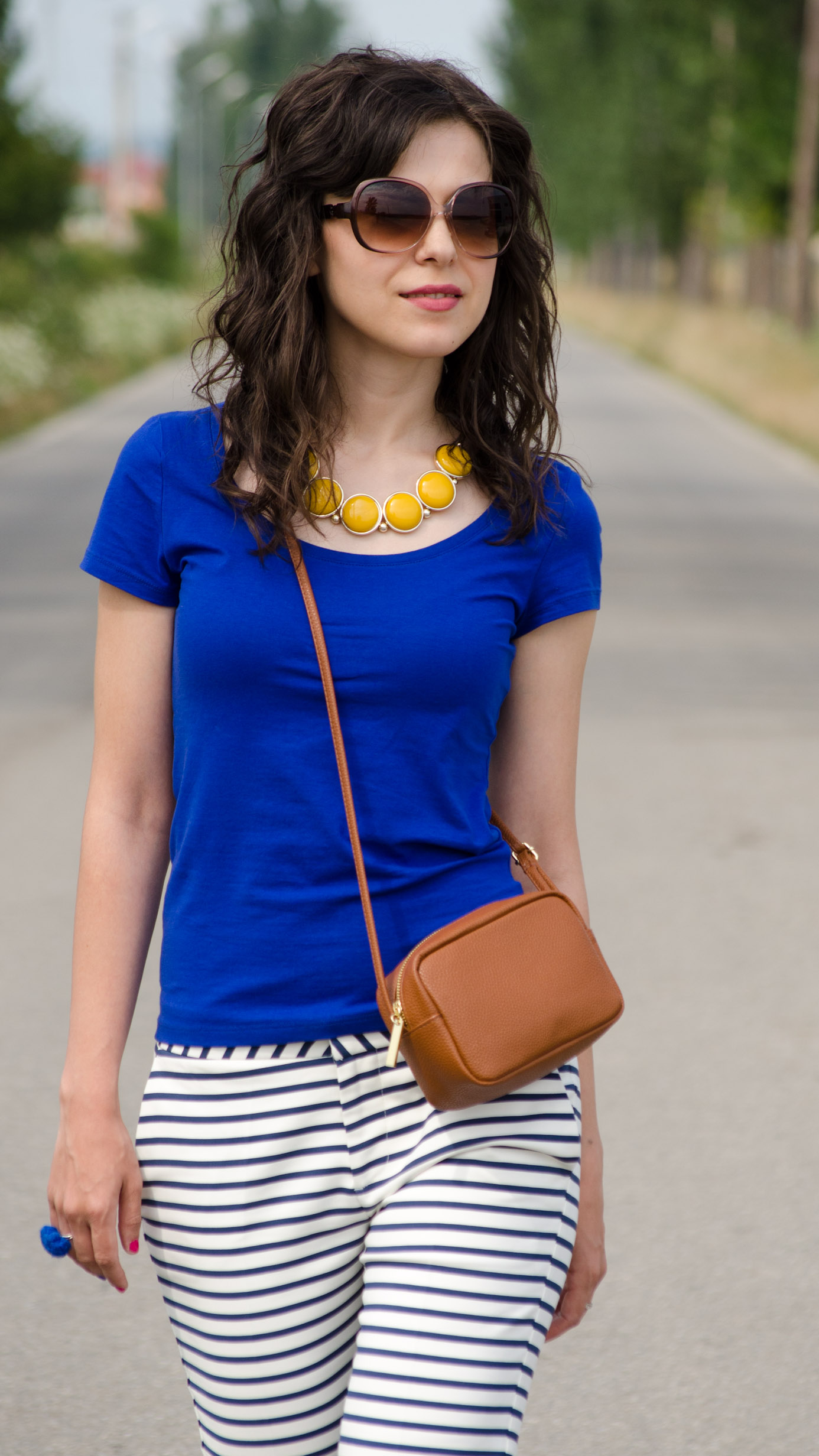 zara navy stripes pants H&M blue t-shirt brown satchel mustard statement necklace poema