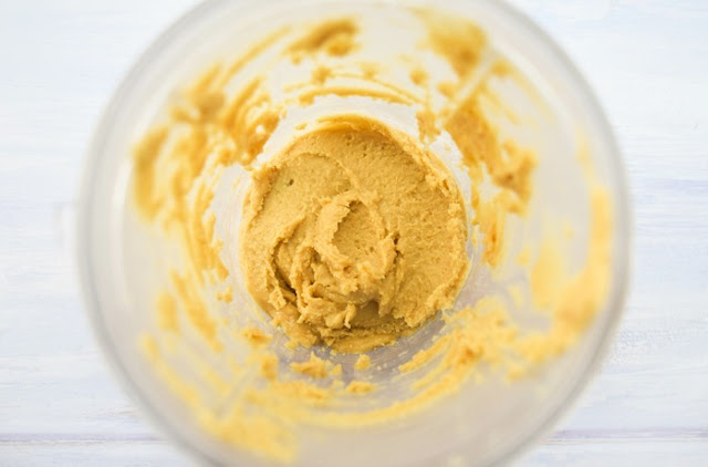 Making peanut butter - step 2 - blended peanut butter in blender jug