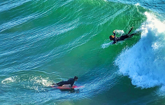 It's very interesting to watch these surfers observing the wave mood of the ocean and accordingly making the move around the coastline. I realised that this adventurous sport also teaches you about the patience & calmness. Lot of patience is needed to watch the wave and then ride on it correctly. 