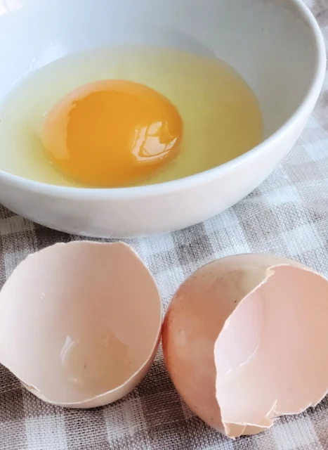 egg cracked in bowl