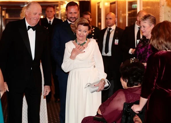 Queen Sonja, style. Princess Mette-Marit wore Miu Miu white long dress, Prada shoes,Velentino clutch bag