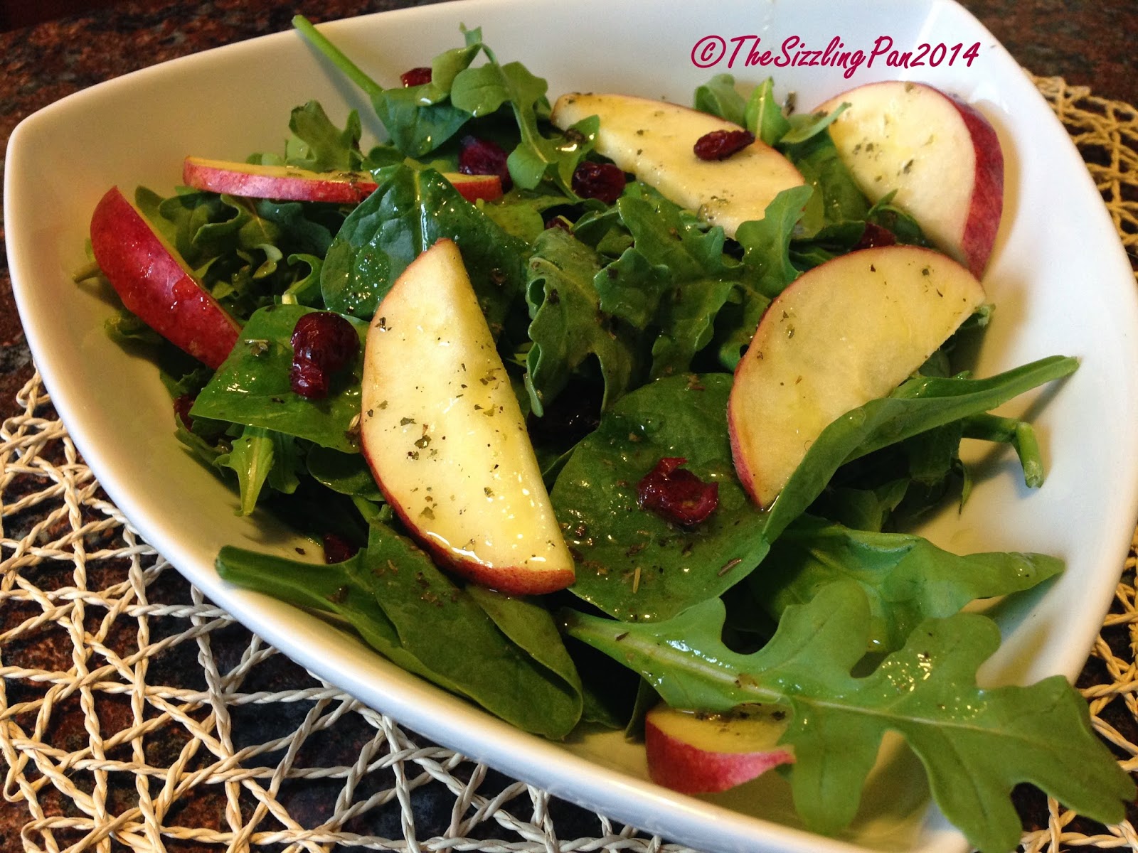 The Sizzling Pan SpinachArugulaApple salad with Mango Vinaigrette
