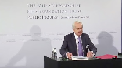 Still frame from res conference at launch of the Francis Report