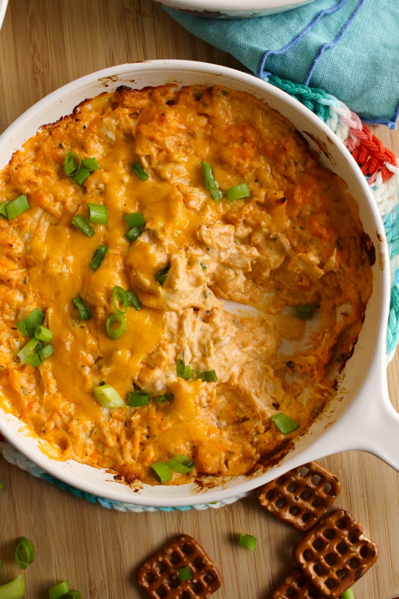 Buffalo Ranch Chicken Dip is creamy, cheesy, spicy, and so delicious! It's the perfect dip for parties and game day. #buffalochicken #appetizer #diprecipe