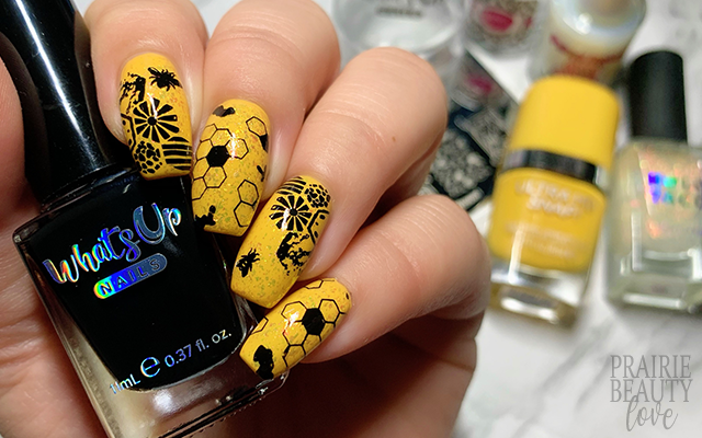 beautiful black-and-yellow manicure with shellac varnish in the form of a  sign of radioactive danger. hands of the girl on a black shiny background  Stock Photo - Alamy