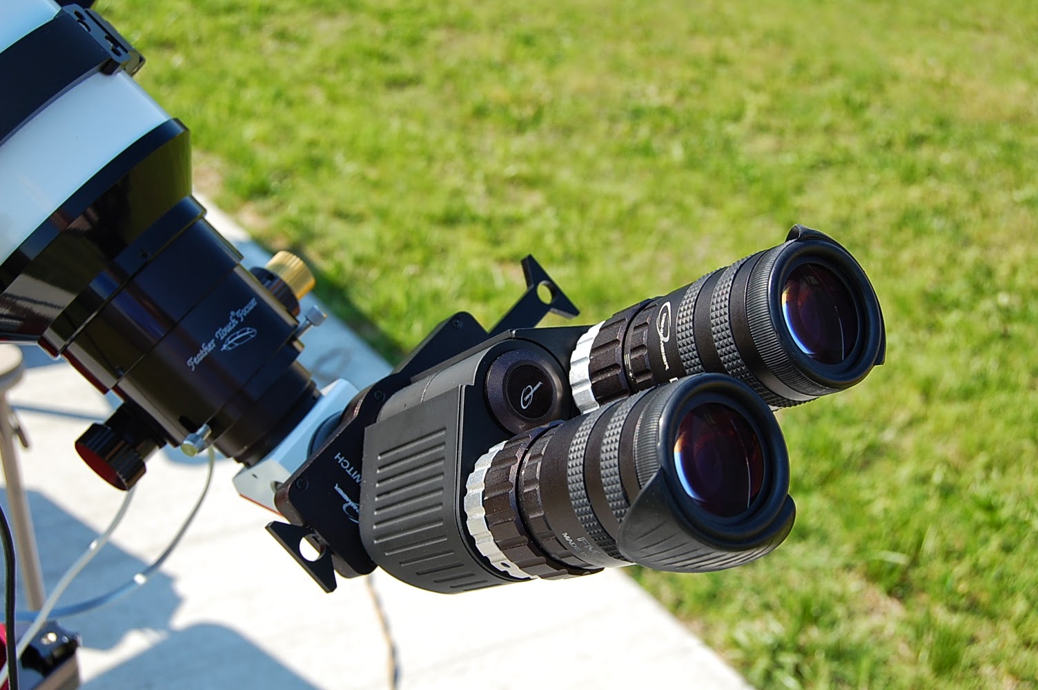 Transparent to Neutrinos New Binocular Eyepiece