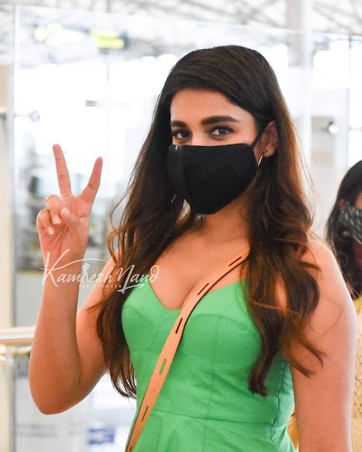 Nidhhi Agerwal Latest Photos in Green Dress Shows Off Her Cleavage Actress Trend