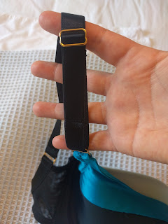 Close up of the strap and metal hardware on the Lottie