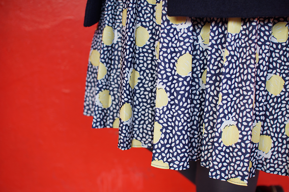 Close up of amazing 80s print dress from the vintage kilo sale lemon pattern dress, vintage pattern with yellow flowers
