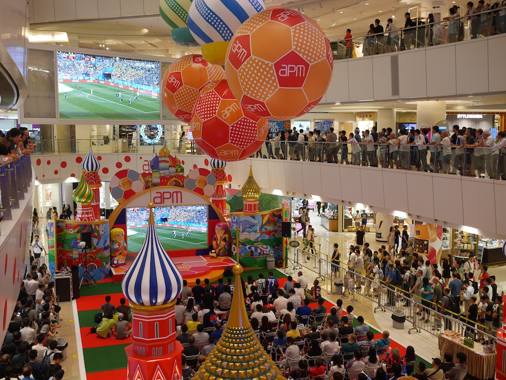 A Large Crowd at a Hong Kong Mall Watches Japan Defeat Colombia in an